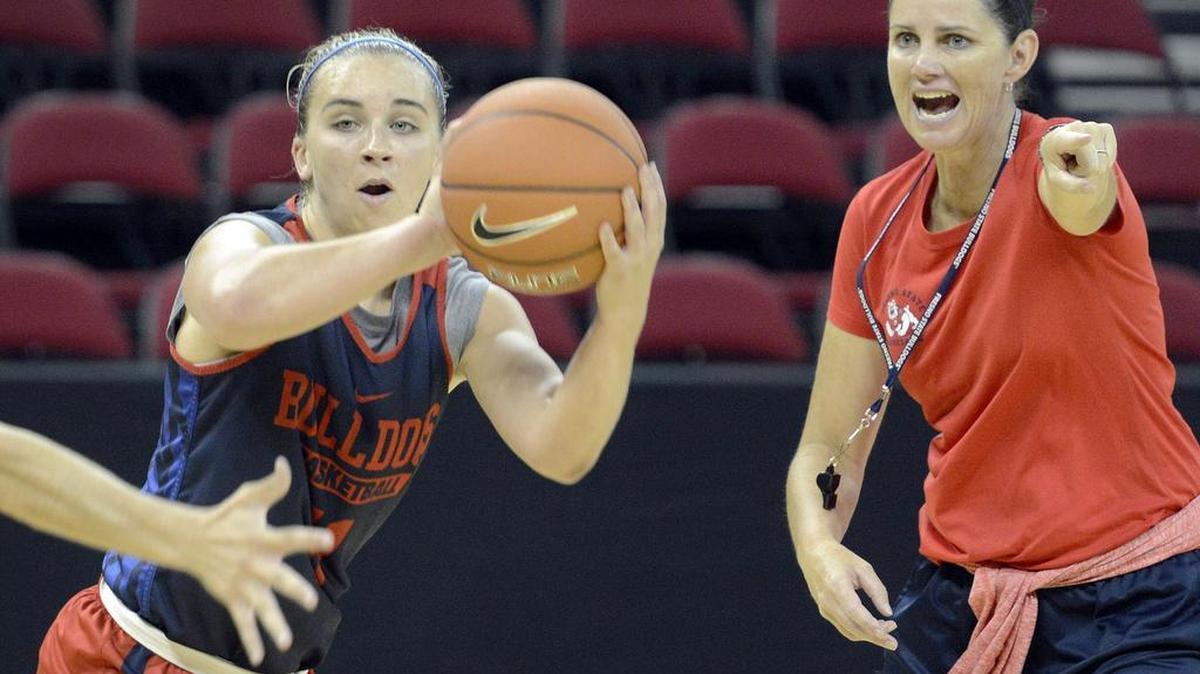 Coach Jaime White, right, has the Fresno State women’s basketball team off to a 1-1 start heading into Friday’s game agaisnt Washington at Save Mart Center. Senior guard Alex Furr, at left, is averaging 8.0 points per game in the young season.