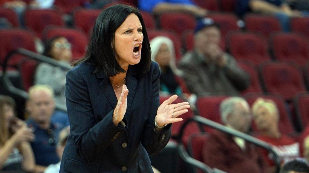 Fresno State women’s basketball coach Jaime White urges her team on in a November game. The Bulldogs, who are battling near the top of the Mountain West early in the conference season, lost 88-75 at New Mexico on Saturday, Jan. 13.