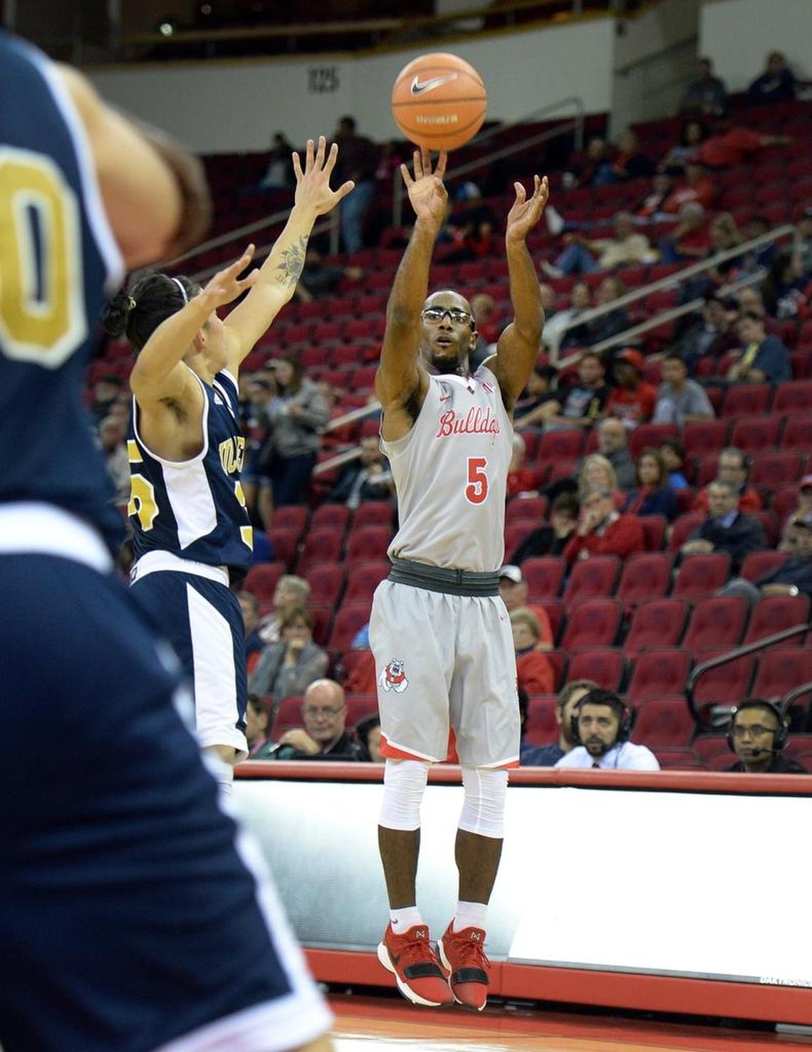 Fresno State guard Jahmel Taylor, center, ranks fifth in the Mountain West Conference in 3-point field goal percentage.Taylor has knocked down 53 of 119 shots, 44.5 percent.