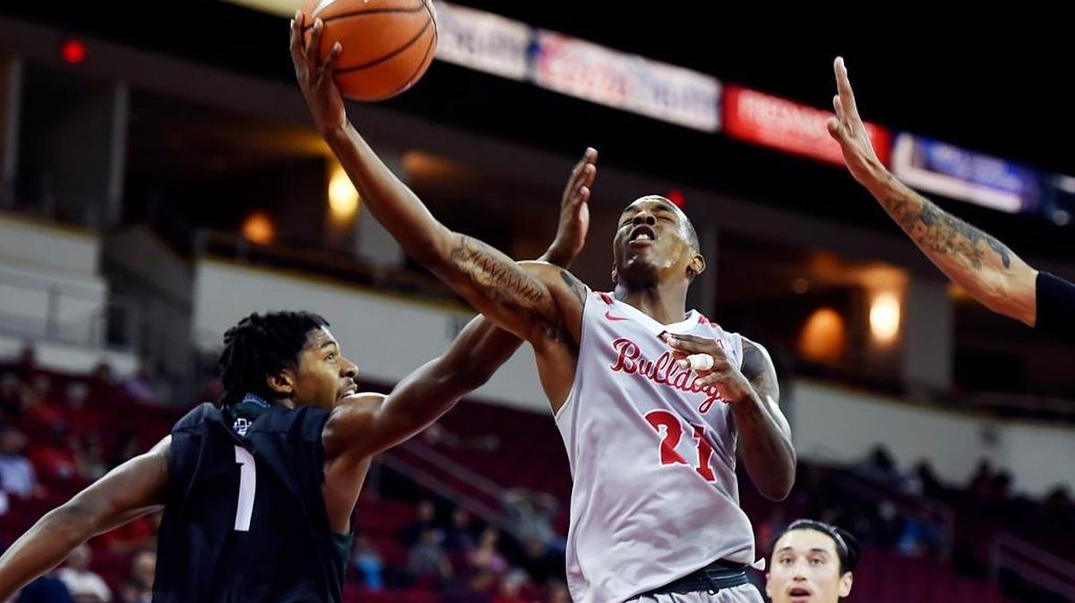 Fresno State’s Deshon Taylor, right, in action in an October game. Taylor led Fresno State with 22 points Saturday, Jan. 6, 2016 as the Bulldogs won 82-79 in overtime at Colorado State.