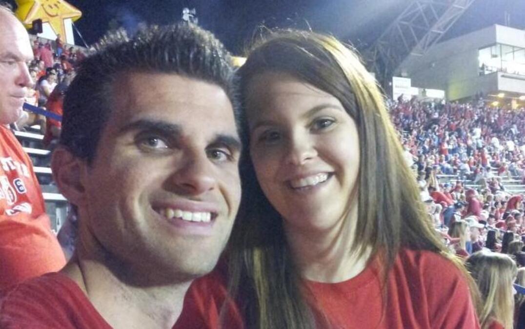 Greg and Ashley Jurica enjoy a Fresno State football game. The two-sport season-ticket holders are heading to Denver on Thursday to watch the Bulldogs men’s basketball team compete in the NCAA Tournament.