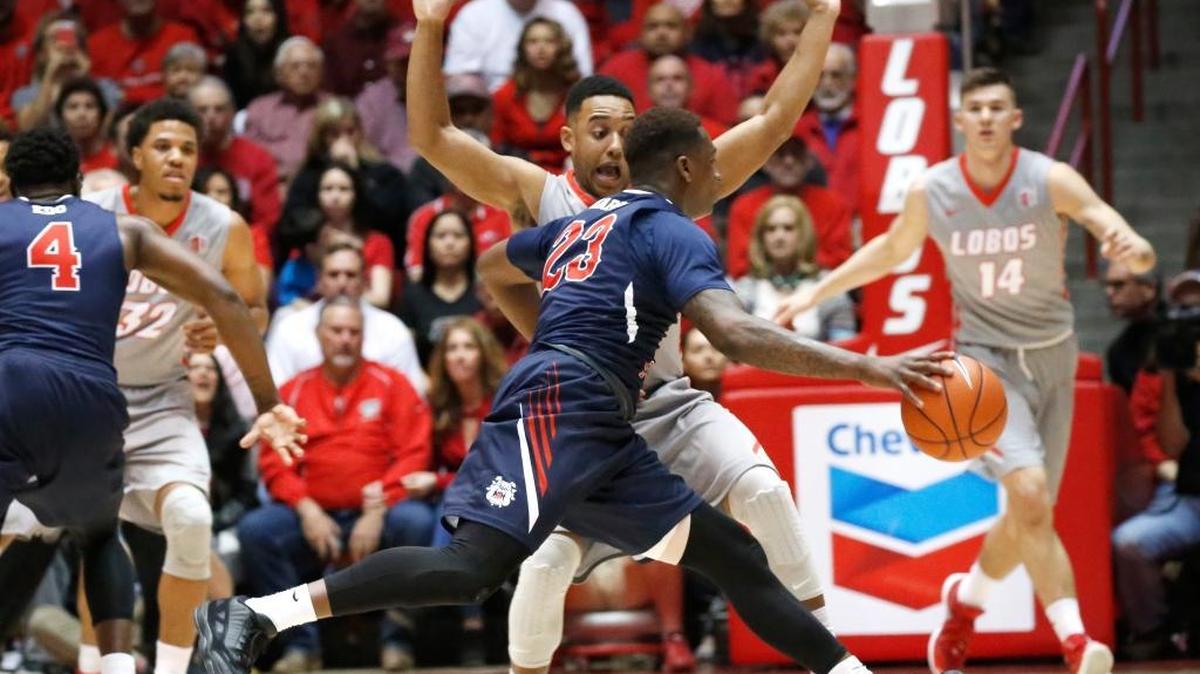 Fresno State’s Marvelle Harris tries to dribble around New Mexico’s Tim Jacobs during the first half of Saturday, Feb. 27, 2016, in Albuquerque, N.M. Harris scored 32 points as the Bulldogs won 92-82 for their first victory over the Lobos at The Pit.
