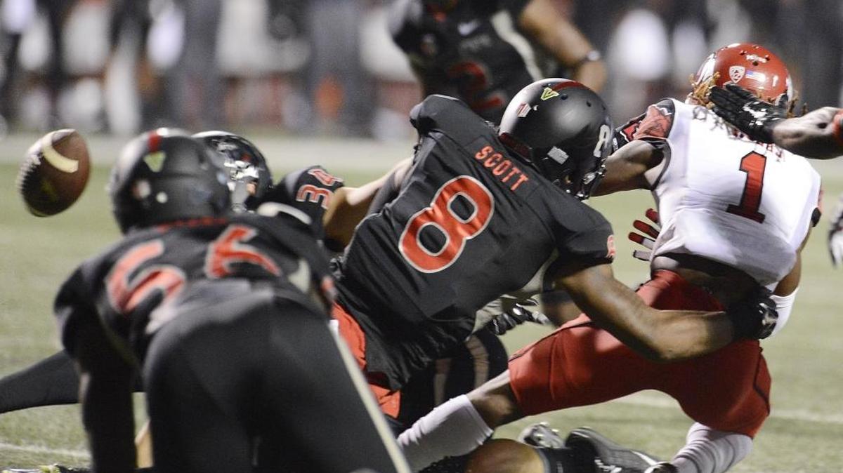 
Fresno State’s Da'Mari Scott is in on the hit of Utah’s Boobie Hobbs, who fumbles the ball on the opening kickoff of the teams’ Sept. 19, 2015, game at Bulldog Stadium. It led to a field goal and an early 3-0 lead, but the Bulldogs fell behind 17-3 by halftime.
