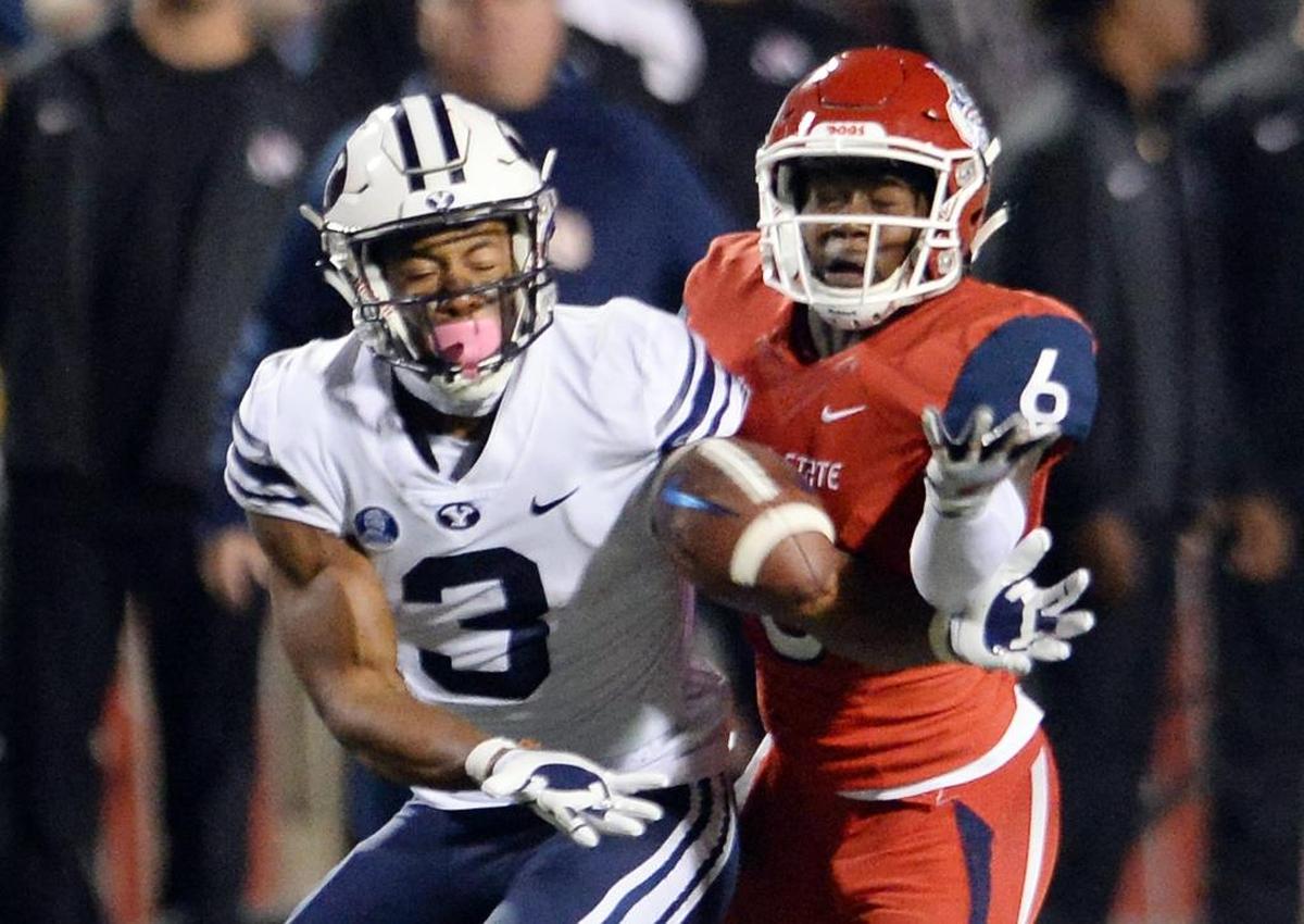 Fresno State cornerback Anthoula Kelly breaks up a pass to Brigham Youing receiver Jonah Trinnaman during the Bulldogs’ 20-13 victory over the Cougars on Saturday, Nov. 4, 2017, at Bulldog Stadium.