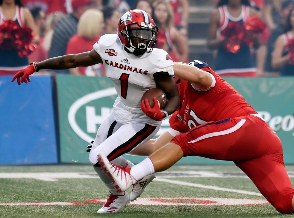 Fresno State defensive tackle Nathan Madsen grabs Incarnate Word’s Desmond Hite in the Bulldogs’ 66-0 victory on Sept. 2. Madsen and the Bulldogs are ranked second in the Mountain West and 14th in the nation in rushing defense, allowing just 107.5 yards per game.