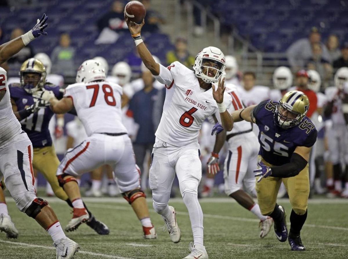 Fresno State quarterback Marcus McMaryion, throwing a pass in the Bulldogs’ loss at No. 6 Washington, has completed only 19 of 35 passes (54.3 percent) for 172 yards over the past three halves of football. McMaryion and the Bulldogs return home on Saturday, Oct. 14, 2017, to play New Mexico.