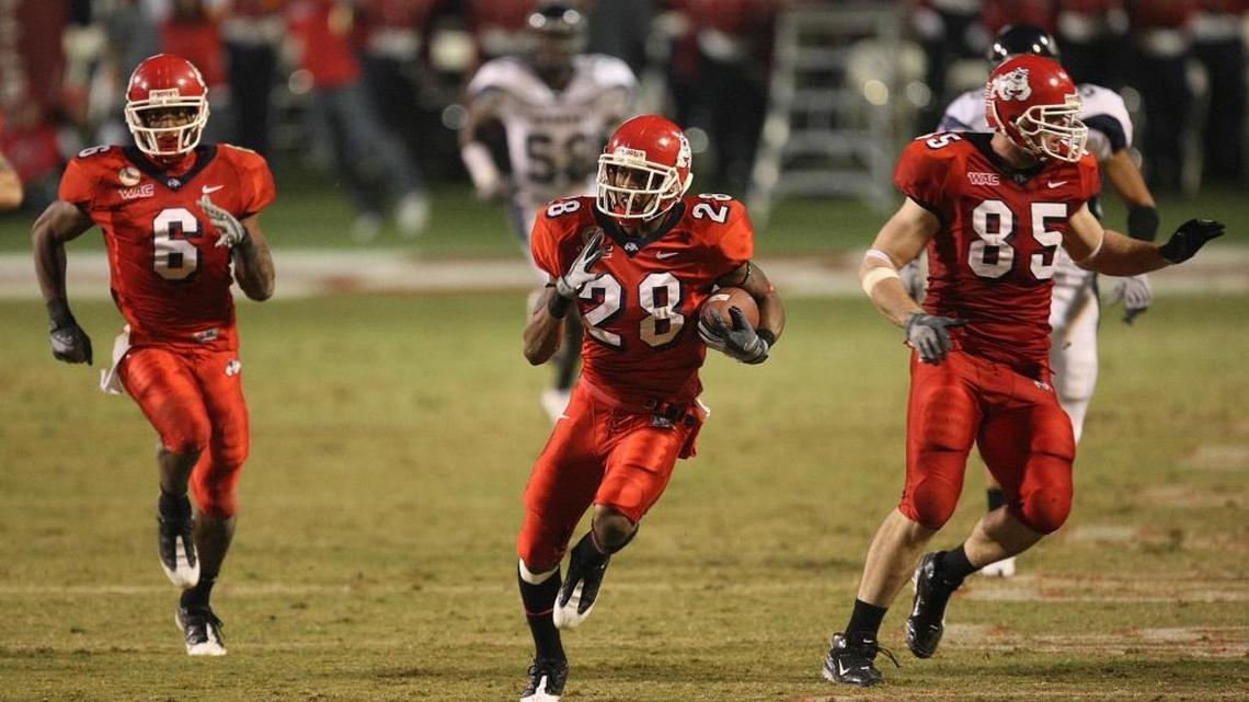 Fresno State’s A. J. Jefferson, led by blockers Chastin West, left, and Bear Pascoe returns a kickoff for a touchdown in the 2008 game against Nevada. The Bulldogs have not had a kickoff return touchdown since, a span of 110 games and 460 kickoff returns.