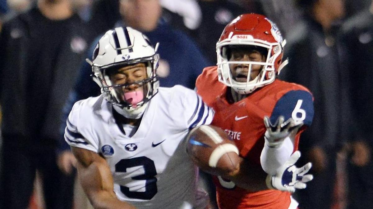 Fresno State cornerback Anthoula Kelly, right, breaks up a pass to BYU's Jonah Trinnaman during the first half of a 20-13 victory at Bulldog Stadium on Saturday, Nov. 4, 2017. Fresno State had 10 pass breakups in the game, a team-high three by Kelly.