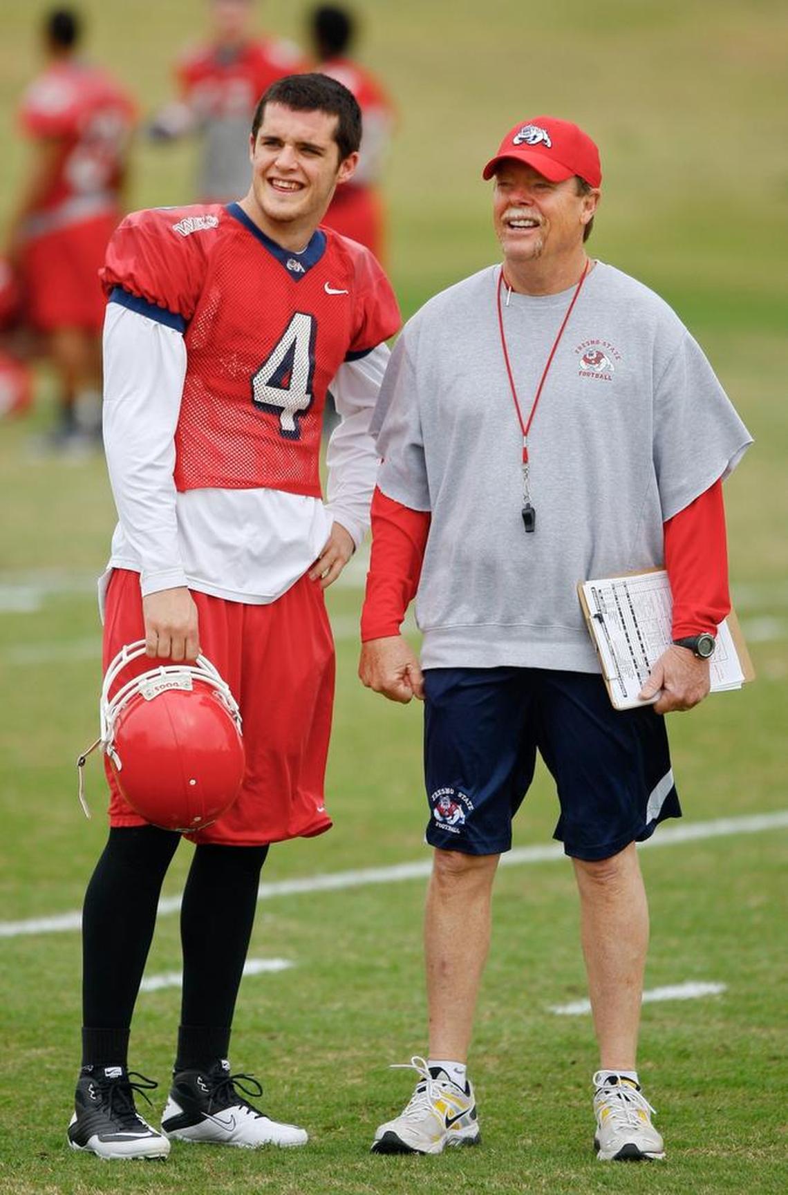 Derek Carr and Pat Hill on the practice field in March 2011.