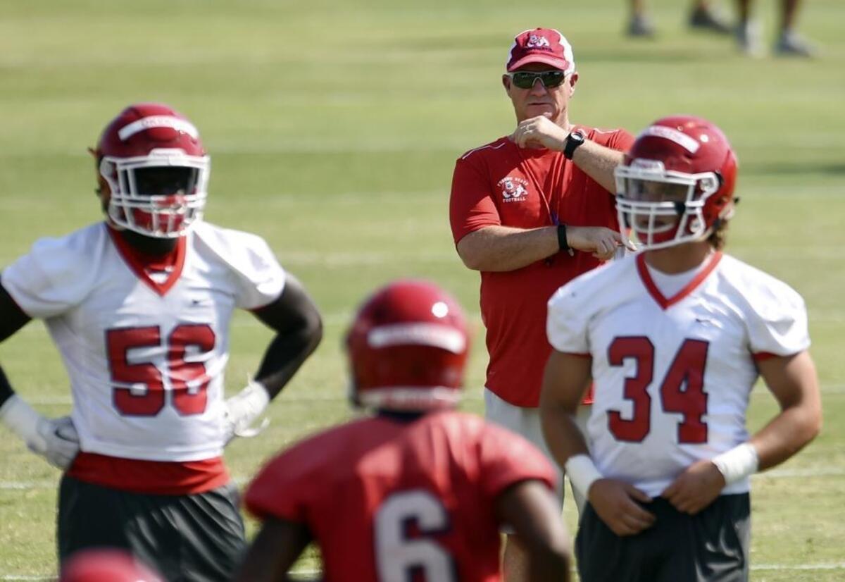 Jeff Tedford watches as Fresno State begins fall practice Aug. 1, 2017. The first-year coach doesn’t figure to get a long honeymoon, with the football program counted on not only to win to rebuild its own fan base, but to raise athletic department revenues needed to pay for the rest of the school’s sports teams.