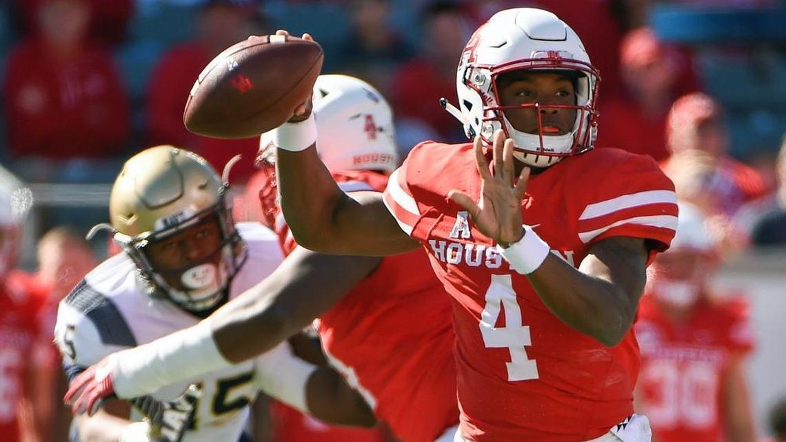 Houston quarterback D'Eriq King (4) throws a pass during the Cougars’ 24-14 victory over Navy, Friday, Nov. 24, 2017, in Houston. King has started the past three games for Houston, completing 73.0 percent of his passes for 832 yards with four touchdowns and one interception.