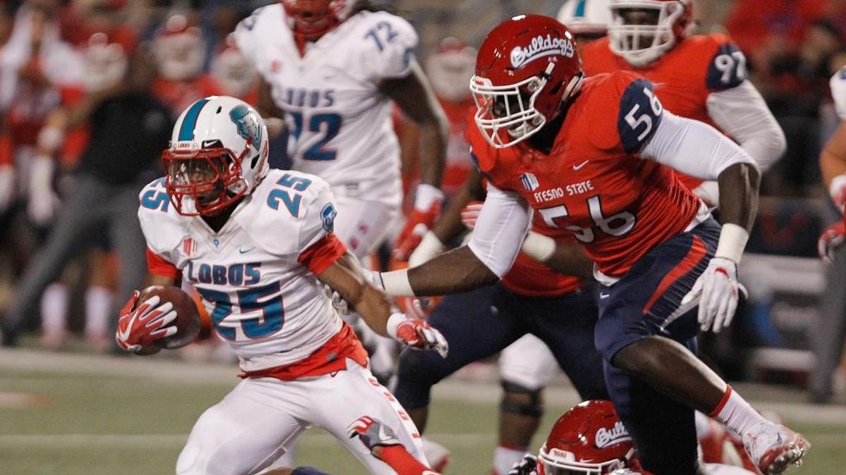 Fresno State defensive end Tobenna Okeke chases down New Mexico running back Tyrone Owens during the first half of the Bulldogs’ 38-0 victory at Bulldog Stadium, Saturday, Oct. 14, 2017. Okeke with 9.0 tackles for loss is tied with defensive end Robert Stanley for most on a defense that is third in the Mountain West with 68.0 TFLs. Last season, Fresno State was ranked 11th with 56.0 tackles for loss.