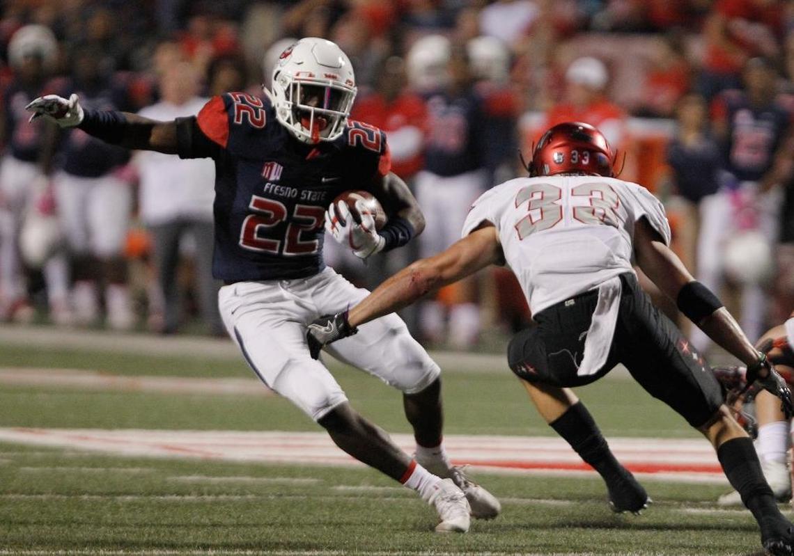 Fresno State running back Jordan Mims tries to go around UNLV’s Dalton Baker during the first half of the Bulldogs’ 26-16 loss Saturday, Oct. 28, 2017. Mims rushed for 68 yards and two touchdowns on 12 plays in the loss. Mims had one rushing touchdown going into the game, that coming in a season-opening victory over Incarnate Word.