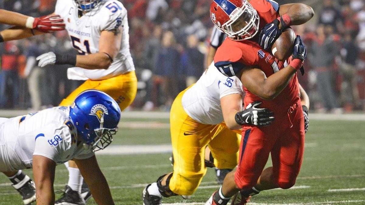 Former Fresno State linebacker Kyrie Wilson, right, agreed to an UDFA deal with the Oakland Raiders, joining former Bulldogs star Derek Carr.