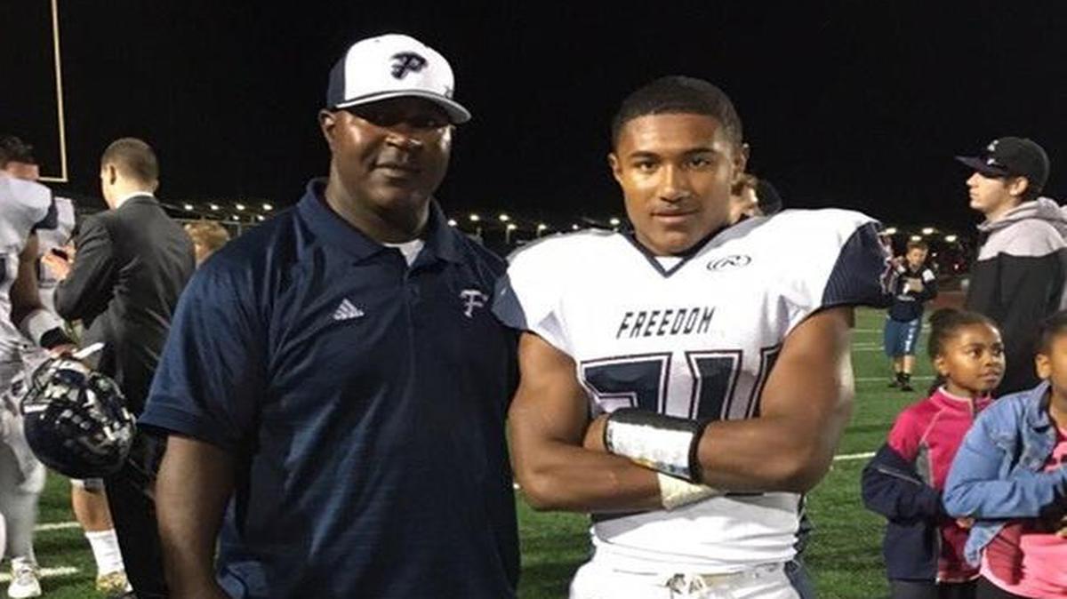 Freedom High-Oakley running back Ronnie Rivers, right, committed to Fresno State on Monday to play for new coach Jeff Tedford. Rivers’ dad, Ron, left, played for the Bulldogs in the early 1990s.