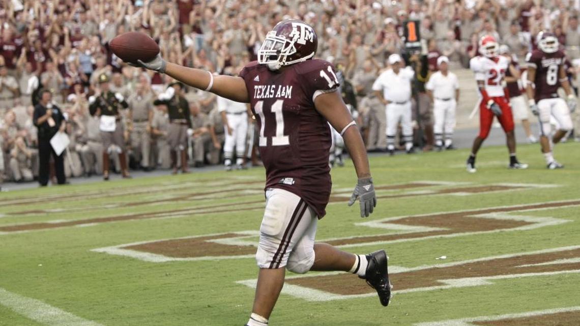 Texas A&M’s Jorvorskie Lane celebrates as he scores on a two-point conversion against Fresno State during the third overtime Sept. 8, 2007, in College Station. Texas A&M beat Fresno State 47-45.