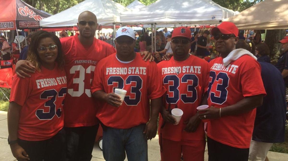
About 100 of Marteze Waller’s family and friends made the 506-mile drive from Eatonton, Ga., to Oxford, Miss., to support the Fresno State tailback Saturday. They included (left to right) Latoria Mullins, Clinton Mullins, Dwayne Mathis, Tyrone Reid and Shawn Mullins. 

