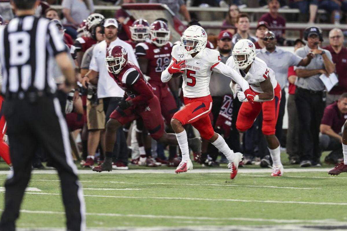 Fresno State freshman wide receiver Jalen Cropper scores on a 79-yard touchdown run against New Mexico State. Cropper is one of 19 Freesno State players to start their first college games this season.