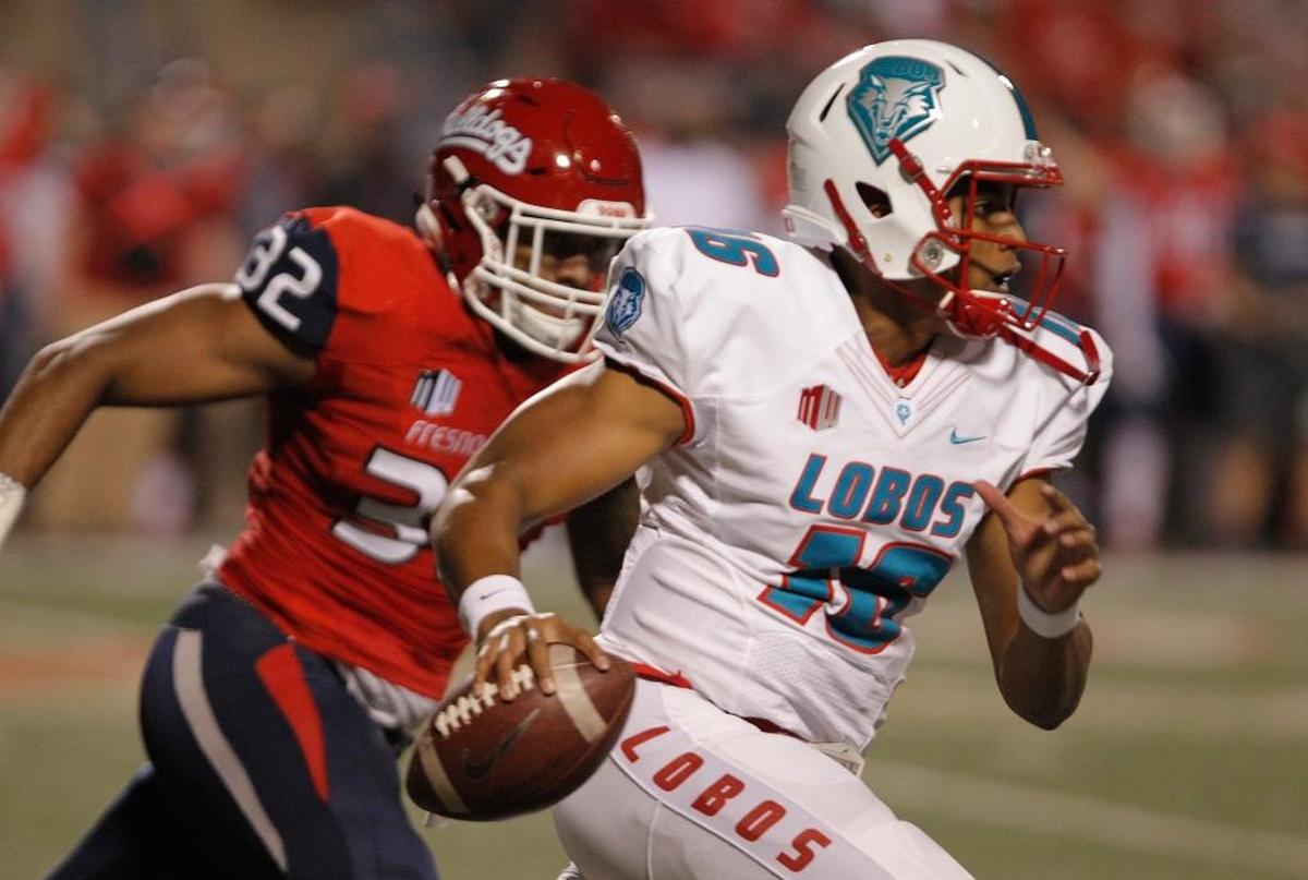 Fresno State defensive end Robert Stanley chases down New Mexico’s Jacob Girgle during the first half of the Bulldogs’ 38-0 victory on Saturday, Oct. 14. The win put Fresno State in first place in the West Division of the Mountain West Conference at 3-0, one game ahead of 2-1 San Diego State.