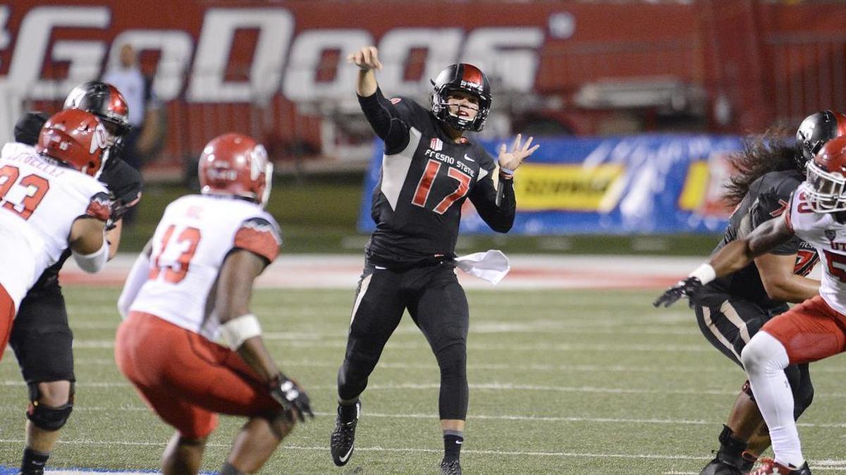 
Fresno State quarterback Zack Greenlee throws against Utah at Bulldog Stadium, Saturday, Sept. 19, 2015. 
