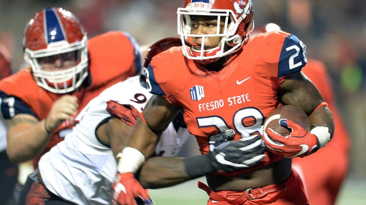 Fresno State running back Dontel James gets hit in the backfield during a run attempt against San Diego State in the first half of their game at Bulldog Stadium Friday, Oct. 14, 2016. James, who has battled through injuries during his Fresno State career, has taken a medical retirement.