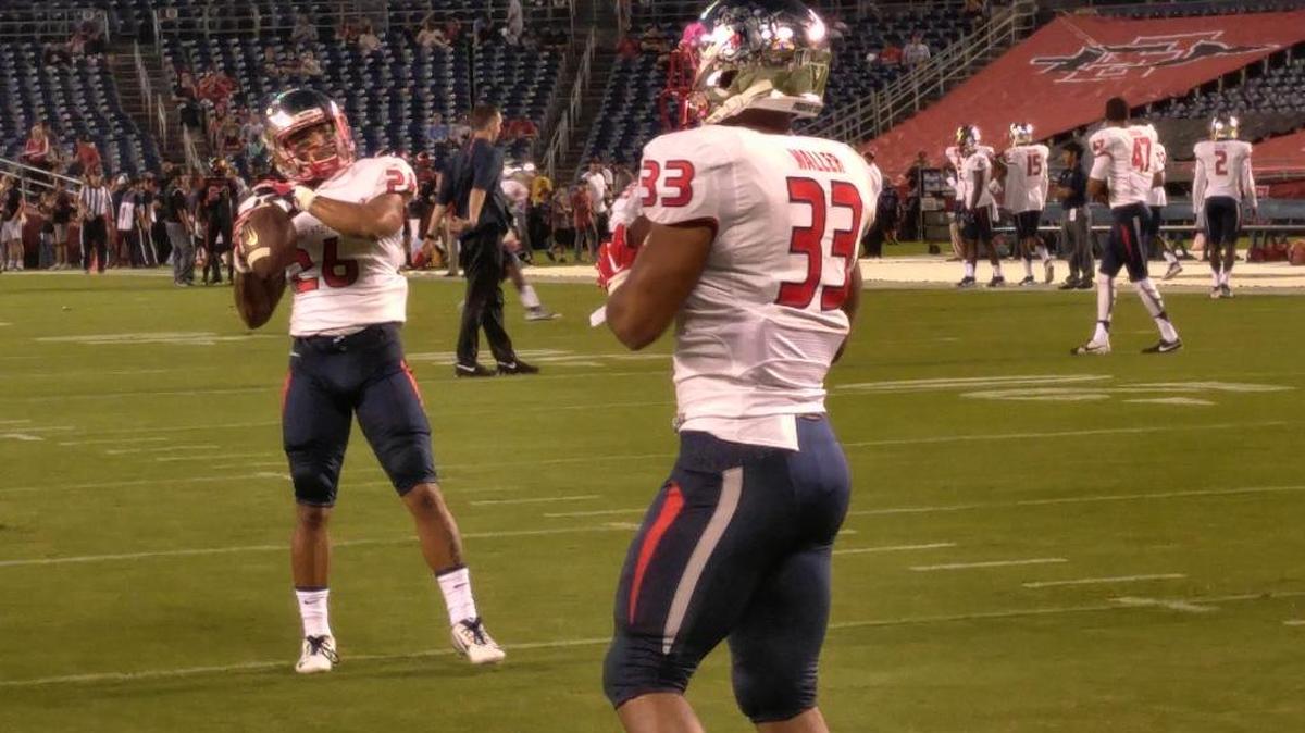 
Fresno State senior running backs Marteze Waller and Dustin Garrison warm up ahead of Saturday’s game at San Diego State. Waller leads the Bulldogs with 379 yards on 85 carries but has yet to score a touchdown.
