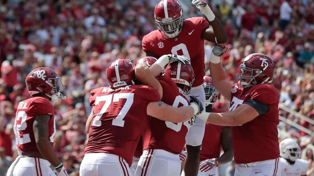 Alabama running back Bo Scarbrough celebrates after Alabama tight end Hale Hentges scored a touchdown against Fresno State in the first half Saturday, Sept. 9, 2017, in Tuscaloosa, Ala. The top-ranked Crimson Tide built a 28-3 through two quarters en route to a 41-10 victory.