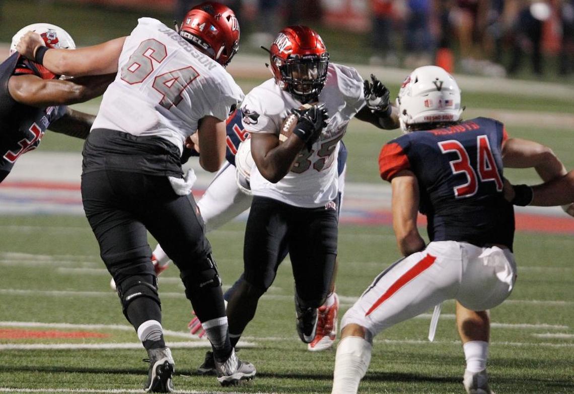 Fresno State linebacker George Helmuth lines up UNLV running back Xzaviar Campbell in the second quarter of the Bulldogs’ 26-16 loss Saturday, Oct. 28, 2017. Helmuth had eight tackles, tied with linebacker Jeffrey Allison and safety Mike Bell for the team lead.