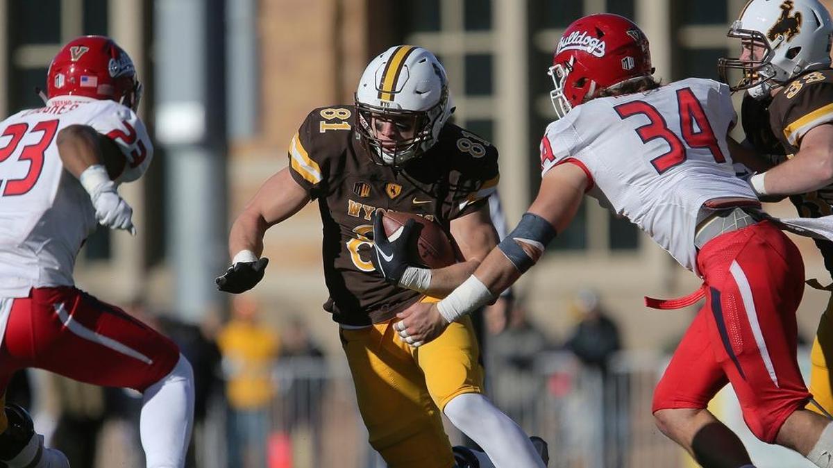 Fresno State linebacker George Helmuth (34) and safety Juju Hughes close on Wyoming tight end Austin Fort during the Bulldogs’ 13-7 victory over the Cowboys at War Memorial Stadium on Saturday, Nov. 18, 2017, in Laramie, Wyo. Fresno State gave up just 308 yards of offense and has not allowed a Mountain West opponent 200 total yards in a half this season.