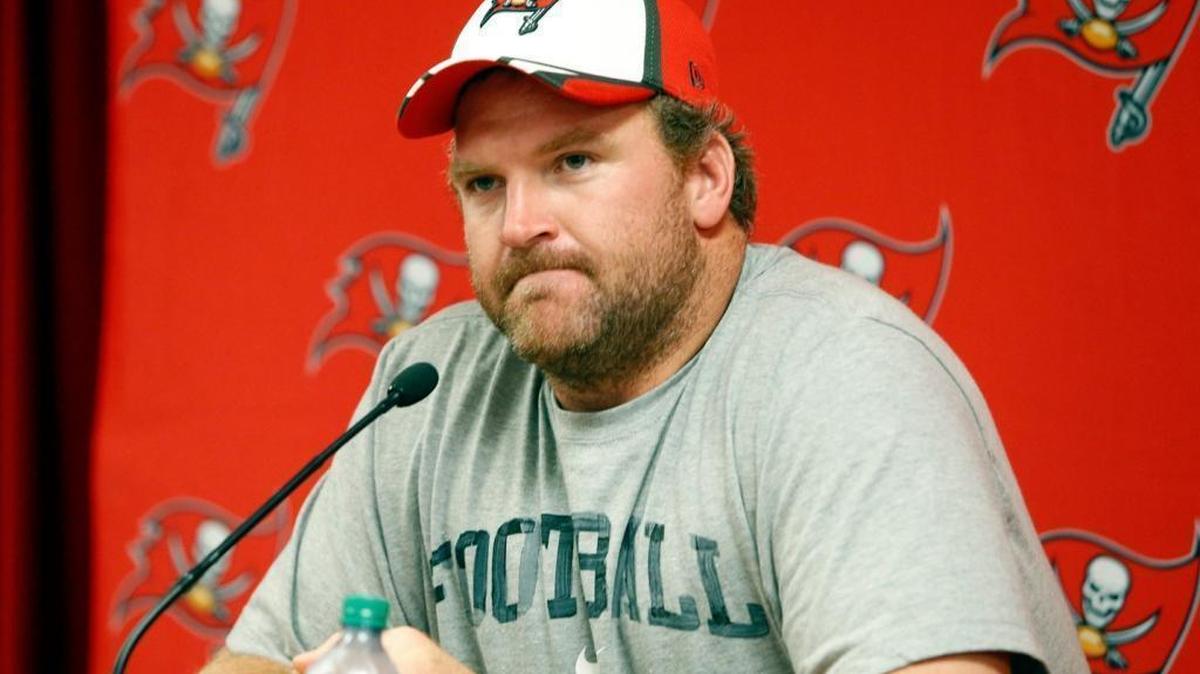 In an August 2014 file photo, new Tampa Bay Buccaneers guard Logan Mankins meets with members of the media. Mankins had played nine seasons with New England before being traded to Tampa Bay.