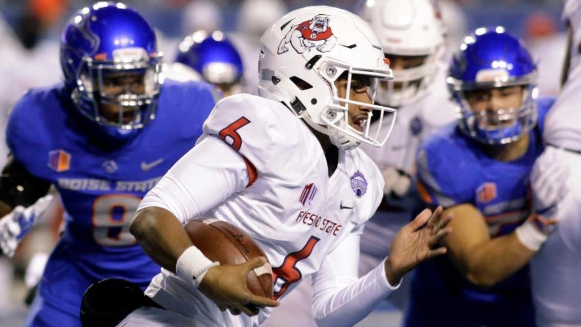 Fresno State quarterback Marcus McMaryion runs the ball during the first half of the Mountain West Conference Championship Saturday, Dec. 2, 2017 at Albertsons Stadium in Boise.