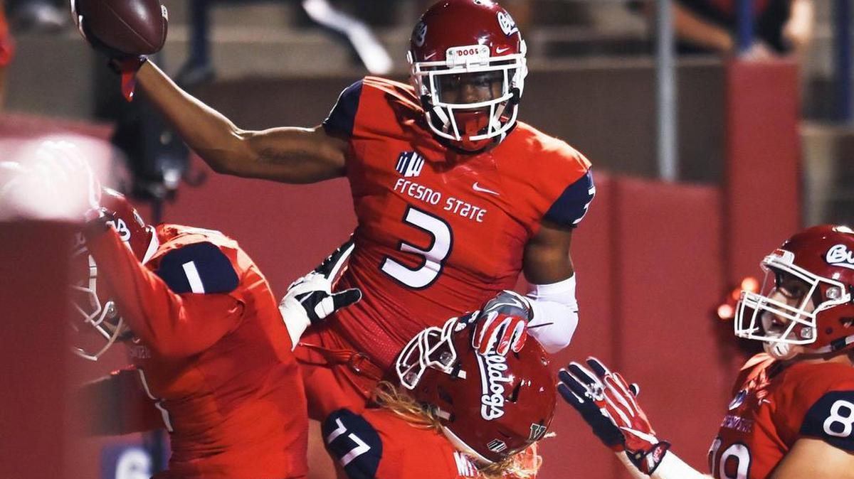 Fresno State wideout KeeSean Johnson, top, caught six passes for 118 yards in the Bulldogs’ opening rout of Idaho. He was most productive working with quarterback Marcus McMaryion on third downs, catching two passes for 63 yards and two first downs.