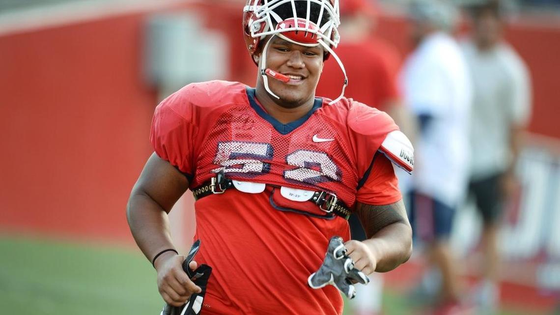 Fresno State offensive lineman Netane Muti smiles during practice before the 2017 season opener.