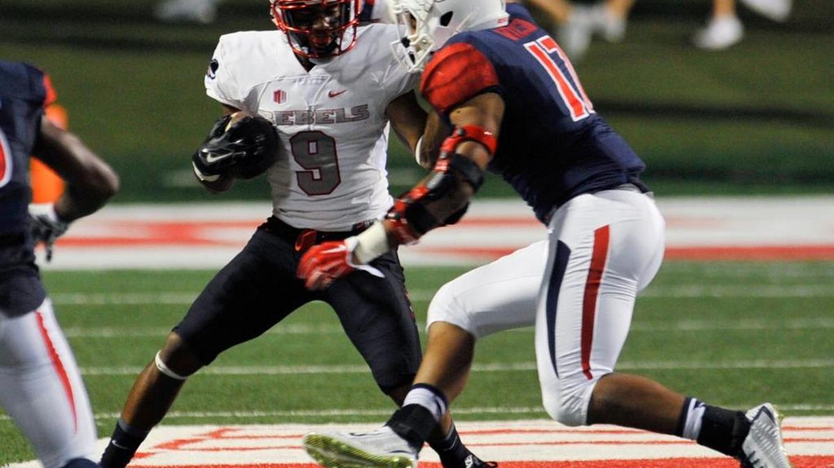 Fresno State’s Kyrie Wilson, here taking down UNLV’s Keith Whitely in an Oct. 16 game against UNLV, rates as one of the key figures in helping the Bulldogs shut down the powerful running game of Air Force.