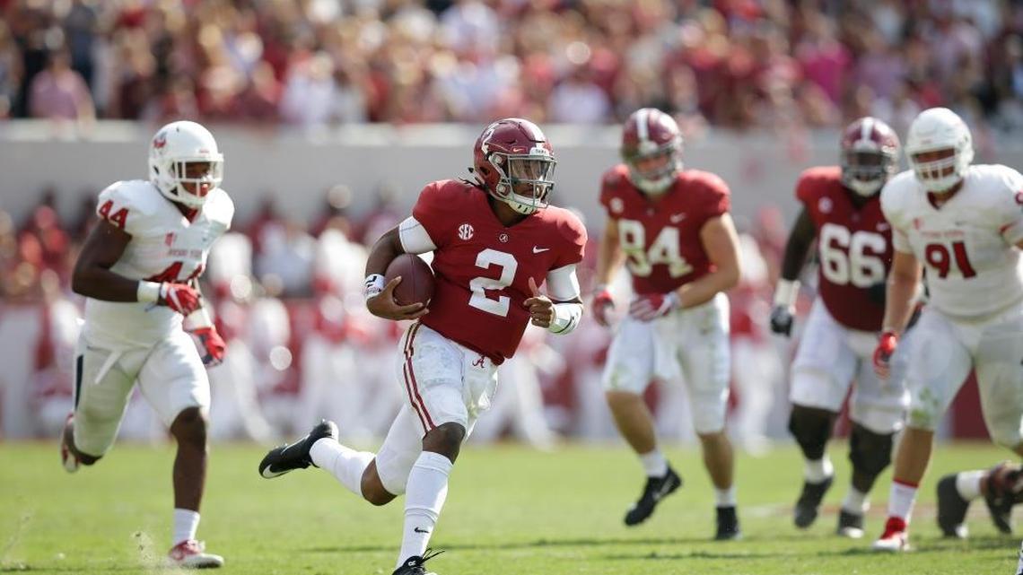 Alabama quarterback Jalen Hurts celebrates after running for a touchdown in the first half Saturday, Sept. 9, 2017, in Tuscaloosa.
