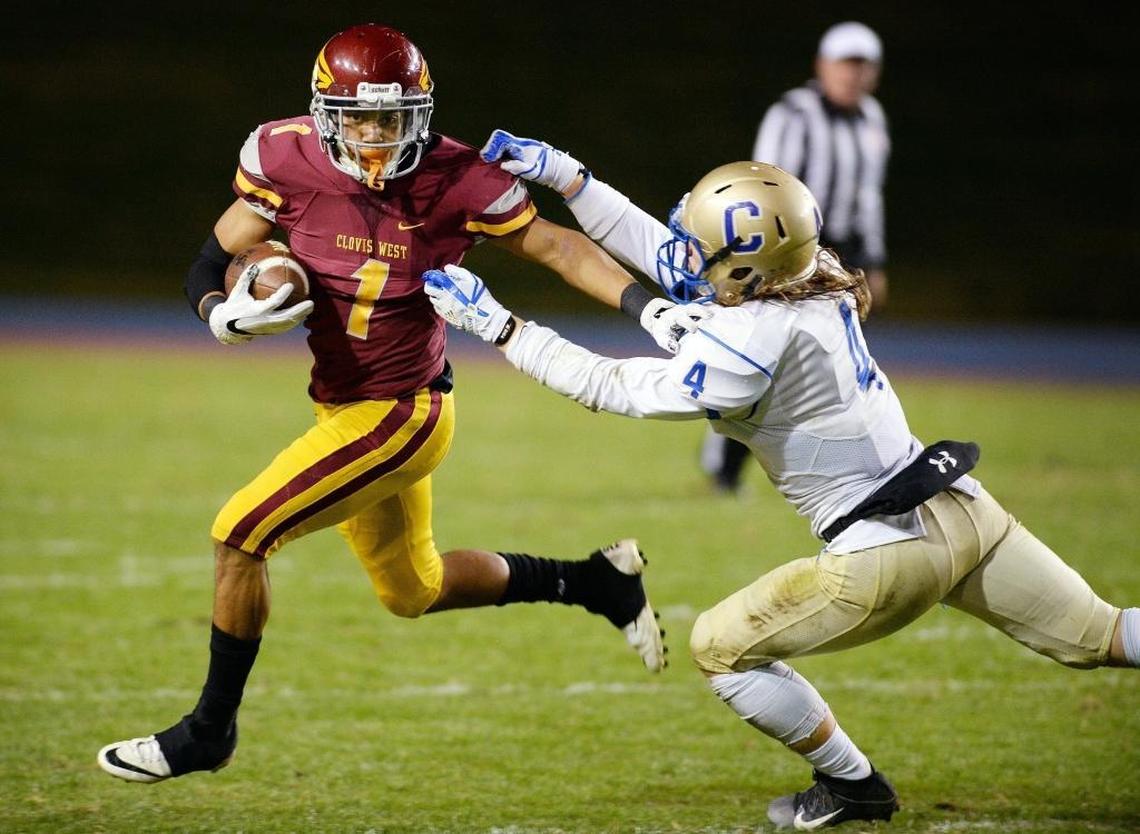 Clovis West wide out Rodney Wright III, left, signed a national letter of intent with Fresno State during the early signing period in December. He racked up 1,477 total yards and scored 25 touchdowns as a senior.
