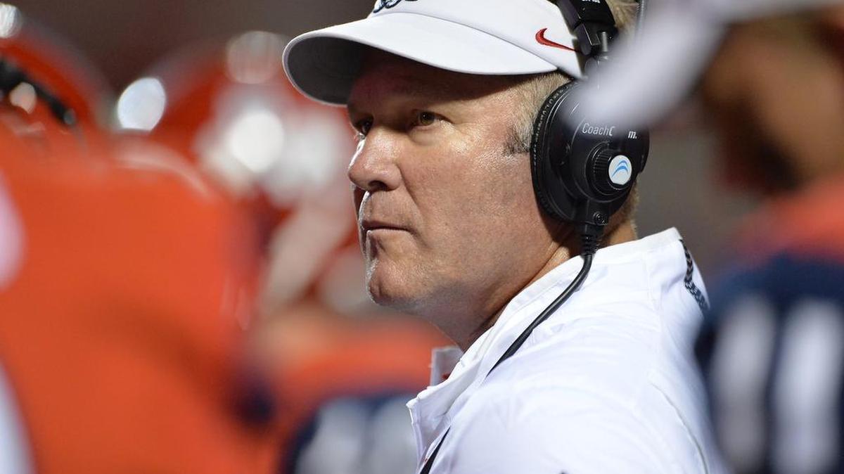 Fresno State football coach Tim DeRuyter, shown during the Bulldog’s game against Utah State on Oct. 10, says he and staff know that when recruiting they’re looking at more than just a player on film. They aim to recruit a player who is “the right kind of guy to bring into our program, that he’ll stick it out through hard times and help us win championships.”