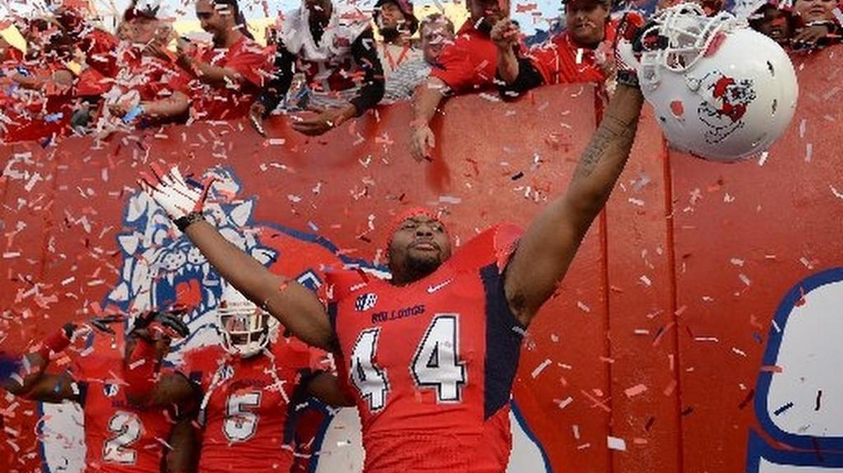 
Fresno State’s Jaamal Rose celebrates in the corner of the end zone after a 69-28 victory over New Mexico clinched the 2013 Mountain West Conference West Division title. Rose is back for the senior season of a career twice interrupted by ACL injuries.
