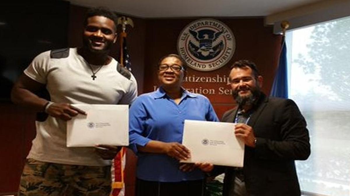 Former Fresno State defensive end Claudell Louis is now an American citizen. He received his citizenship May 31, along with mom, Illna, right. His father, Winer, became an American citizen on Tuesday.