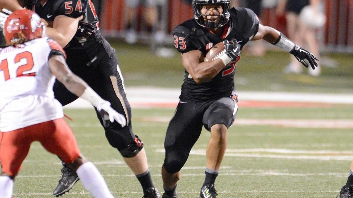 
Fresno State’s Marteze Waller finds an opening on a run against Utah in a game at Bulldog Stadium on Sept. 19.
