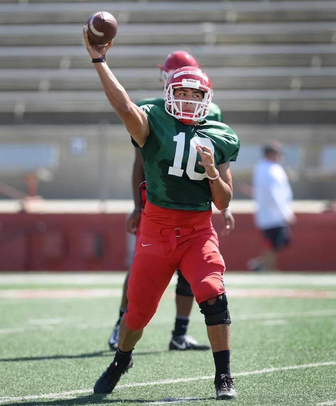 Fresno State quarterback Jorge Reyna passes during football practice at Bulldog Stadium on Tuesday, Aug. 8, 2017.