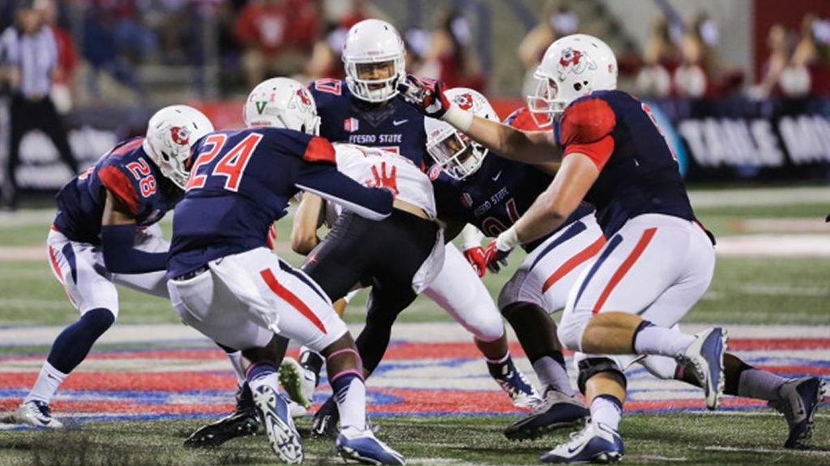 Outside linebacker James Bailey, 24, makes a tackle in his first start against UNLV on Oct. 16. The Bulldogs snapped a five-game losing streak with a 31-28 victory.