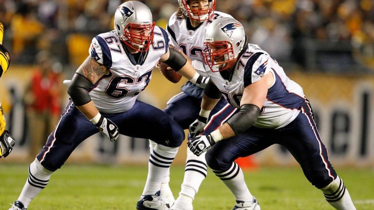 In a November 2010 file photo, Logan Mankins (70) and Dan Koppen (67) protect quarterback New England Patriots quarterback Tom Brady in a game against the Pittsburgh Steelers.