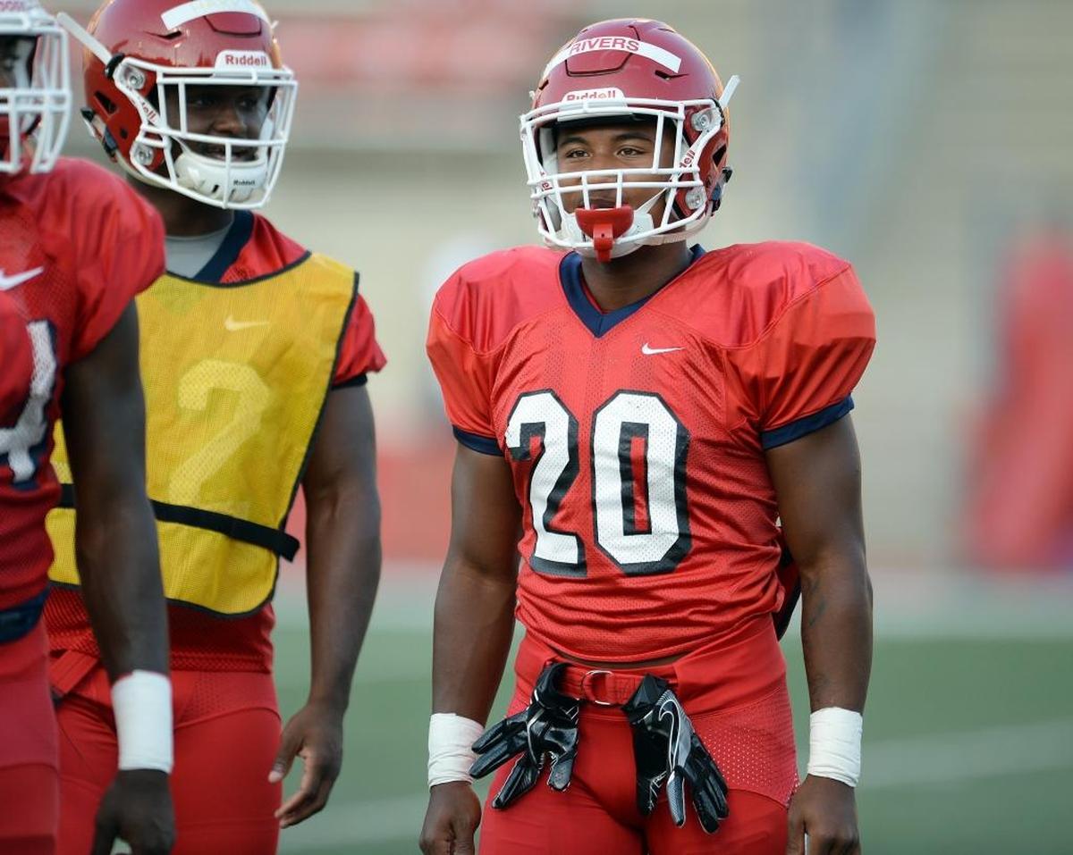 Fresno State running back Ronnie Rivers and the rest of the Bulldogs practice as part of Fan Appreciation Day, which included the only fall scrimmage open to the public, on Saturday, Aug. 19, 2017, at Bulldog Stadium.