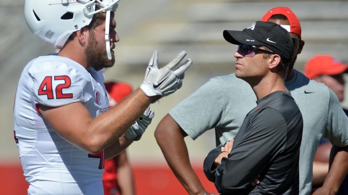 Fresno State’s Nick Toth, right, works with linebacker Jeff Camilli during fall practice last year. While Toth is transitioning from his former post as defensive coordinator to inside linebackers coach, he heads into spring practice without Camilli, a senior who’s out with a leg injury. But sophomore Nela Otukolo, third-year junior Robert Stanley and redshirt sophomore George Helmuth got valuable experience last season, and the Bulldogs also signed junior college transfer Trent Soechting in December out of Blinn College and there will be a ton of reps to go around.