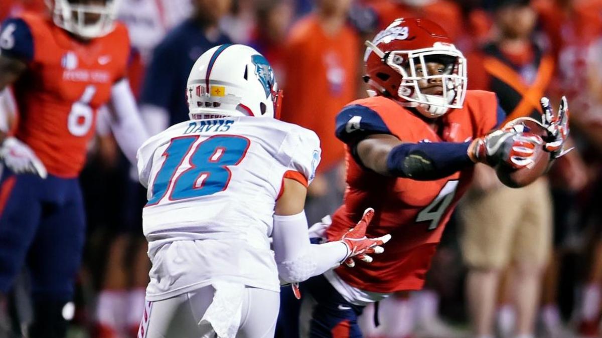 Fresno State safety Mike Bell, right, breaks up a pass intended for New Mexico's Chris Davis, Jr., left, in the second half of the Bulldogs’ 38-0 shutout over the Lobos, Saturday, Oct. 14, 2017 in Fresno. Bell had 10 tackles in the game inclduing eight solo, one interception and one fumble recovery.