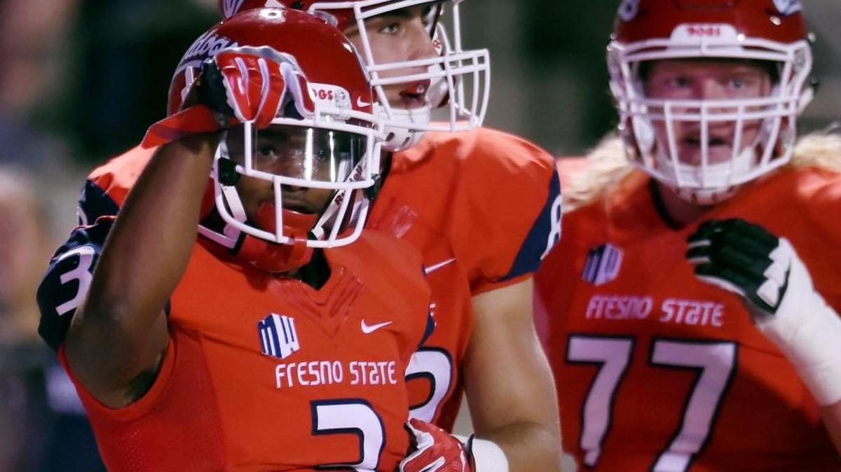 Fresno State wideout KeeSean Johnson, left, celebrates a touchdown in the Bulldogs’ 41-21 victory over Nevada on Saturday, Sept. 30, 2017 in Fresno. Johnson caught three touchdown passes, the second time in his career he has had a three-touchdown game. Johnson also had three last season in a loss to Air Force.