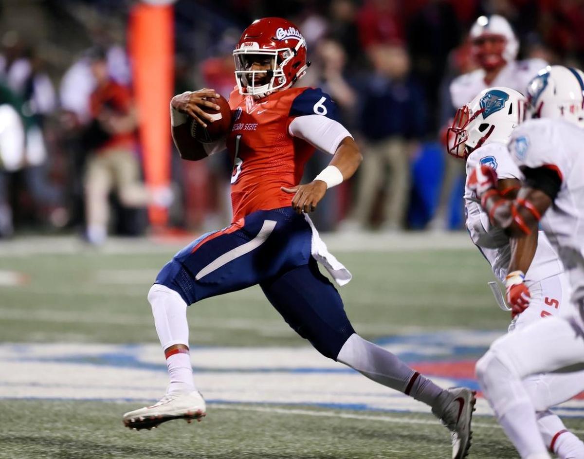 Fresno State quarterback Marcus McMaryion breaks a 57-yard run on a 3rd-and-17 play in the second quarter of the Bulldogs’ 38-0 victory over New Mexico Saturday, Oct. 14, 2017 in Fresno. McMaryion hit 13 of 23 passes for 299 yards and three touchdowns and ran for 50 yards on four plays. The Bulldogs have won all three of the games that McMaryion has started.