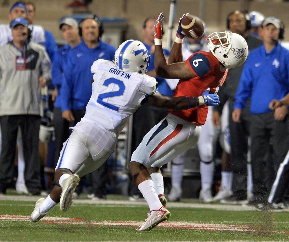 Fresno State wideout Delvon Hardaway, right, adjusts to the ball in the air to make a catch a pass in front of Air Force’s Marquis Griffin in the second half of a 2016 game. Hardaway caught a 50-yard touchdown in the Bulldogs’ first fall camp scrimmage on Saturday, Aug. 11, 2018, using an explosive burst out of his break to run wide open down the middle of the field.