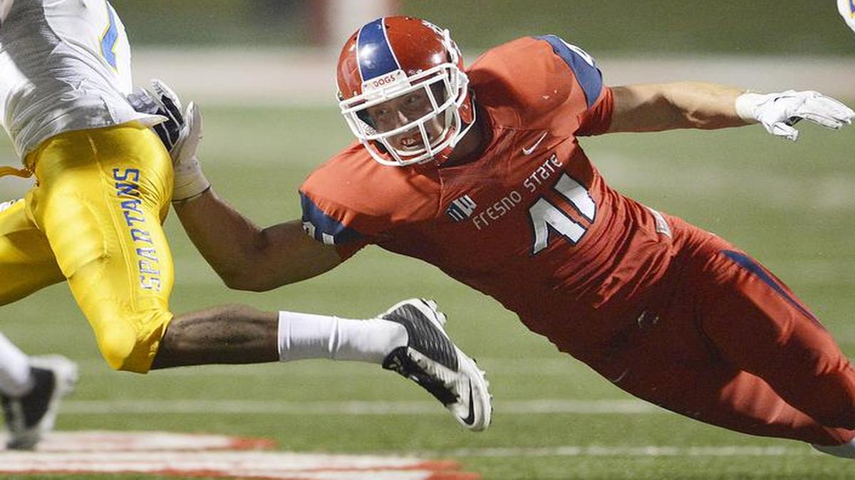 Fresno State outside linebacker Brandon Hughes, at right making a play on San Jose State running back Tyler Ervin during their game in 2014, finished last season with 25 tackles, 3.5 for a loss and 2.5 sacks in eight games.